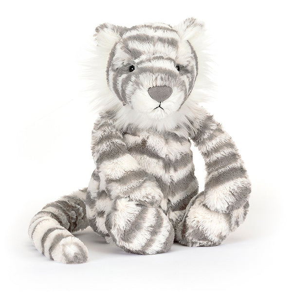 Jellycat Bashful Snow Tiger stuffed animal sitting on a white background.