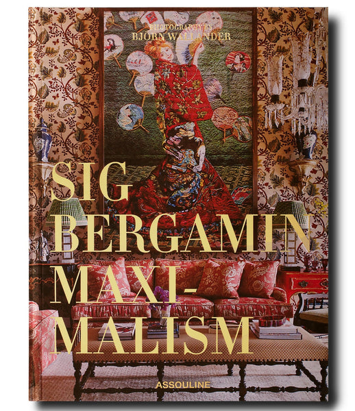 Book cover featuring a richly decorated room with floral patterns, luxurious furnishings, and a large tapestry. The text reads "Sig Bergamin Maximalism" in bold gold letters. Photography by Björn Wallander, capturing his chic designs imbued with vibrant Brazilian style. Published by Assouline.