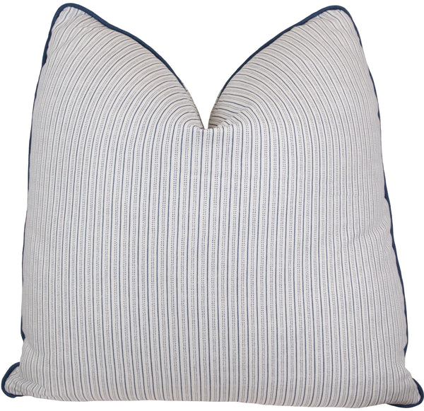 Decorative Knife Edge Pillow with blue and white striped pattern and a dark blue border, fluffed into a peaked shape by Associated Design.