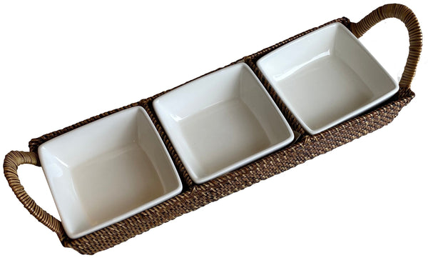 Three white square ceramic bowls are arranged in a Calaisio Rectangular Tray with 3 Procelain Section Server, handmade by artisans using water-vines, with handles on each side.