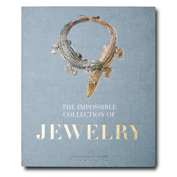 A book cover titled "The Impossible Collection of Jewelry" by Assouline, featuring an ornate jeweled crocodile design on a gray background.