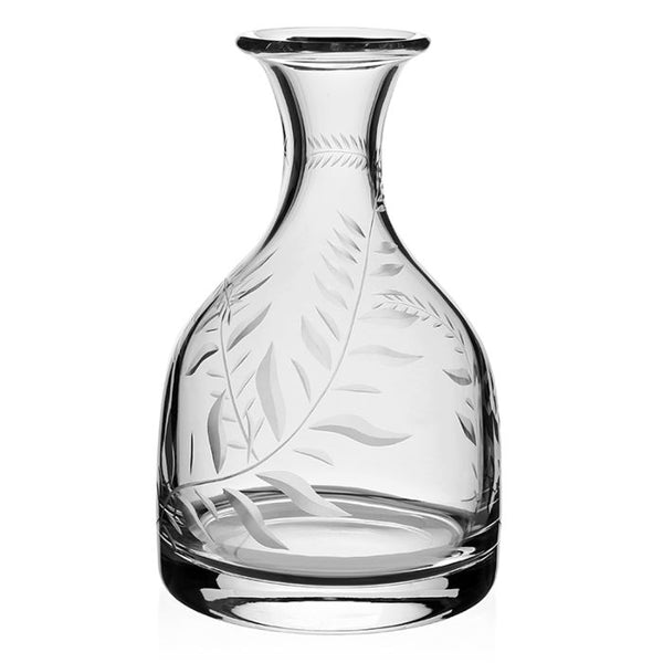 An easy to pour William Yeoward Crystal Jasmine Classic Carafe Bottle with a hand engraved leaf design, known as the Jasmine Carafe.