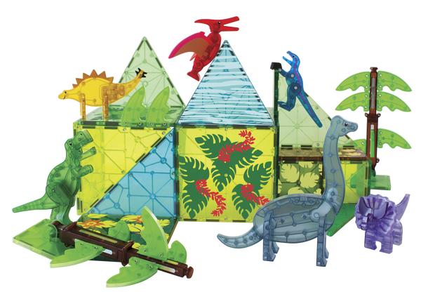 A colorful set of magnetic building tiles, arranged to form a pyramid-like structure, showcases the MAGNA-TILES® Dino World XL 50 Piece Set by Magnatiles, featuring various transparent Magna-Tiles dinosaurs and palm tree pieces surrounding the scene.