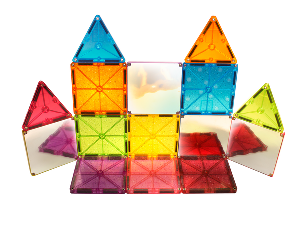 The MAGNA-TILES® Stardust 15-Piece Set by Magnatiles arranges colorful squares and triangles into a symmetrical, castle-like structure, with glitter tiles providing an extra touch of sparkle to the magnetic building set.