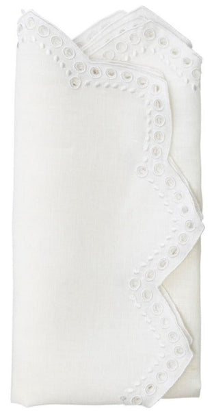 A Kim Seybert Eyelet Tapestry Napkin, Set of 4 with a lace trim.