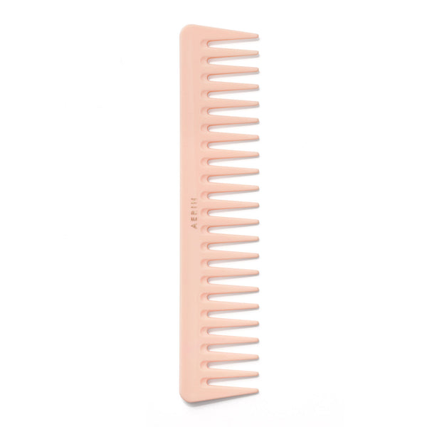 The AERIN Large Pink Pastel Comb by Aerin, handcrafted in Italy, features wide teeth designed to detangle and smooth hair.