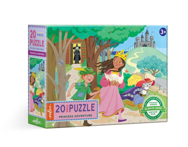 Box of the eeboo 20 Piece Princess Adventure Puzzle by Eeboo, depicting a princess, a young boy, and an anthropomorphic cat in a colorful forest setting. Includes age recommendation of 3+ years.