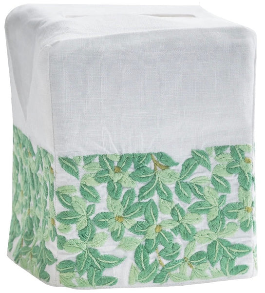 White linen Boxwood tissue box cover with a hand-embroidered green leaf pattern around the base by Haute Home.