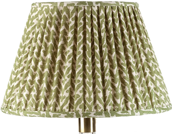 The Fermoie Lamp Shade in Green Rabanna by John Rosselli features a pleated, green and white leaf design made from 100% linen on a metal stand, measuring 6" x 4" x 5".