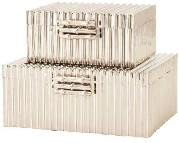 A stack of Corrugated Bamboo Box Nickel heat sinks, designed for electronic component cooling, doubles as a decorative storage solution.