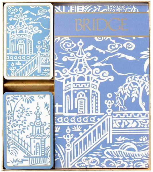 A set of Caspari Pagoda Toile Blue bridge playing cards with ornate building and garden designs, ideal as part of bridge gift sets.