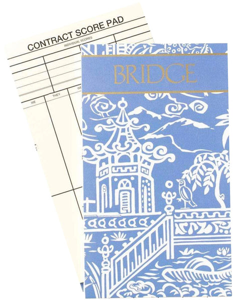 A Caspari Pagoda Toile Blue Bridge Score Pad from the Caspari Bridge collection and a decorative bridge playing card game score pad.