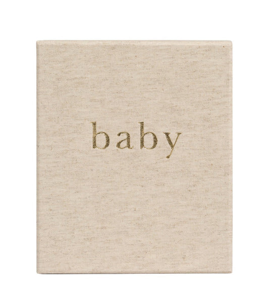 The "Write to Me Baby First Year of You, Oatmeal" by Write To Me is a beige book cover with the word "baby" elegantly written in lowercase letters at the center in a gold font, making it an ideal gender-neutral baby journal that will become a cherished keepsake.