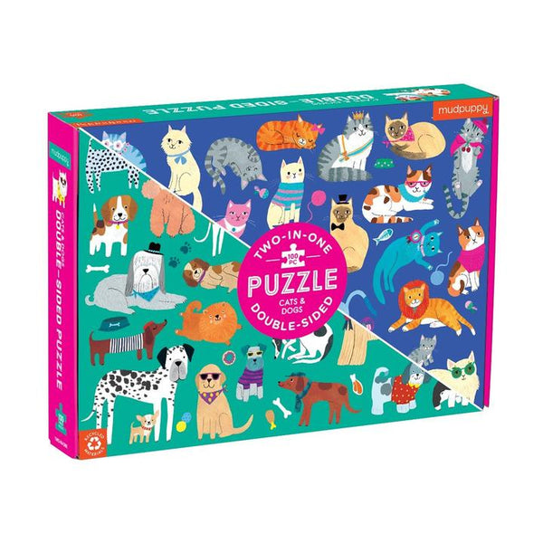 A vibrant box containing a 100-piece double-sided puzzle, showcasing charming illustrations of various cats and dogs. The box reads "Cats and Dogs 100 Piece Double Sided Puzzle" by Chronicle Books and features an eye-catching purple and green design, ideal for a fun family activity.