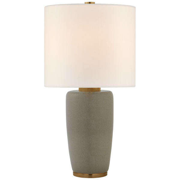 The Chado Large Table Lamp by Visual Comfort features a beige ceramic base with gold accents and a sleek finish, complemented by a cylindrical white lampshade.