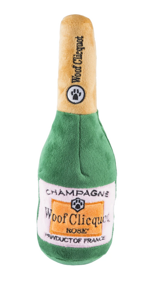 Plush dog toy designed to resemble a bottle of Haute Diggity Dog Woof Clicquot Rosé with a pun on the label by Haute Diggity Dog.