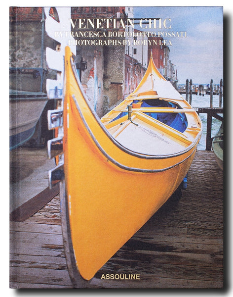 Venetian Chic," a book from Assouline authored by Francesca Bortolotto Possati, features a photograph of a yellow gondola moored along the canal in Venice, with the city's architecture visible in the background. It showcases Venetian art and offers insights into private Venice tours.