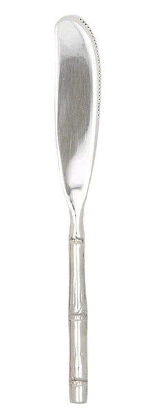 A Liliana Polished Silver Bamboo Cheese Spreader by Blue Pheasant, with a textured handle and a slightly serrated edge on one side, blending a sophisticated feel with island flair.