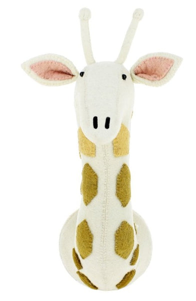 Introducing the Fiona Walker Giraffe Head Wall Decoration in medium size, a beautifully handcrafted piece with embroidered features, a long neck adorned with light brown spots, and large ears lined in pink, all made from organic wool. This stunning decoration is brought to you by Fiona Walker.