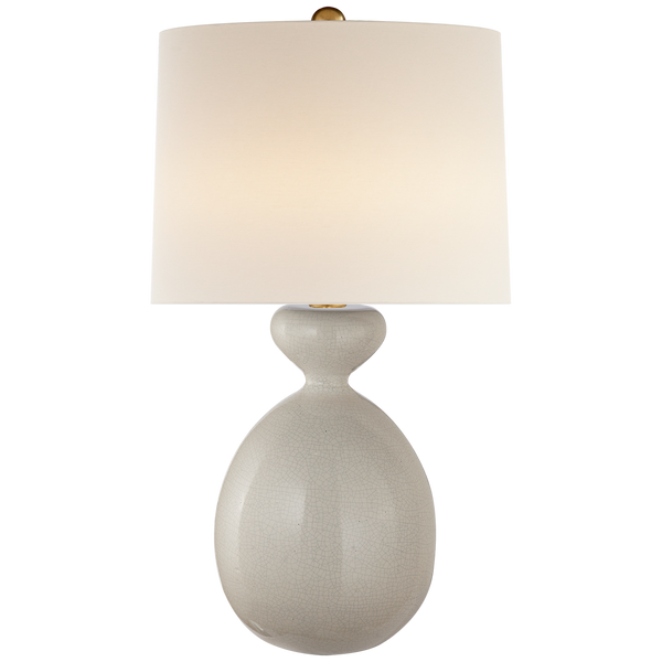 A Gannet Table Lamp, Bone Craquelure by Visual Comfort with a white oval base and a round white lampshade, featuring an adjustable dimmer for customizable wattage.