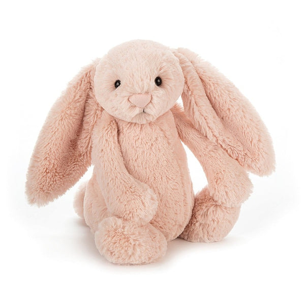 Bashful Blush Bunny by Jellycat sitting on a white background.