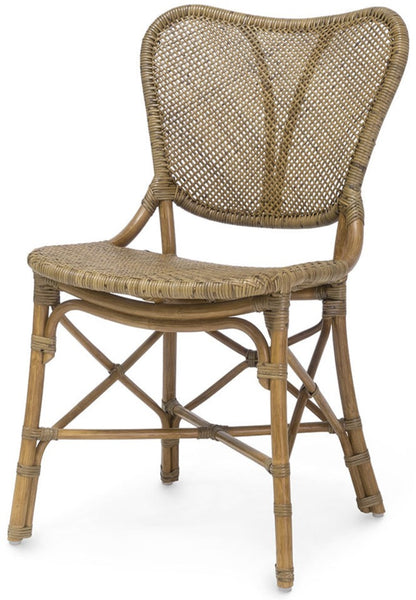 The Jordan Side Chair by PALECEK, a natural-colored rattan chair with a curved backrest and woven seat, featuring a pole rattan frame and honey finish, is shown against a white background.