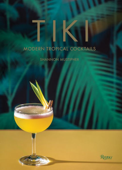 Book cover of "Tiki-Modern Tropical Cocktails" by Shannon Mustipher, featuring a yellow cocktail in a glass with a garnish, set against a backdrop with palm fronds and highlighting the vibrant world of Tiki cocktails crafted with Caribbean rums, published by Rizzoli.